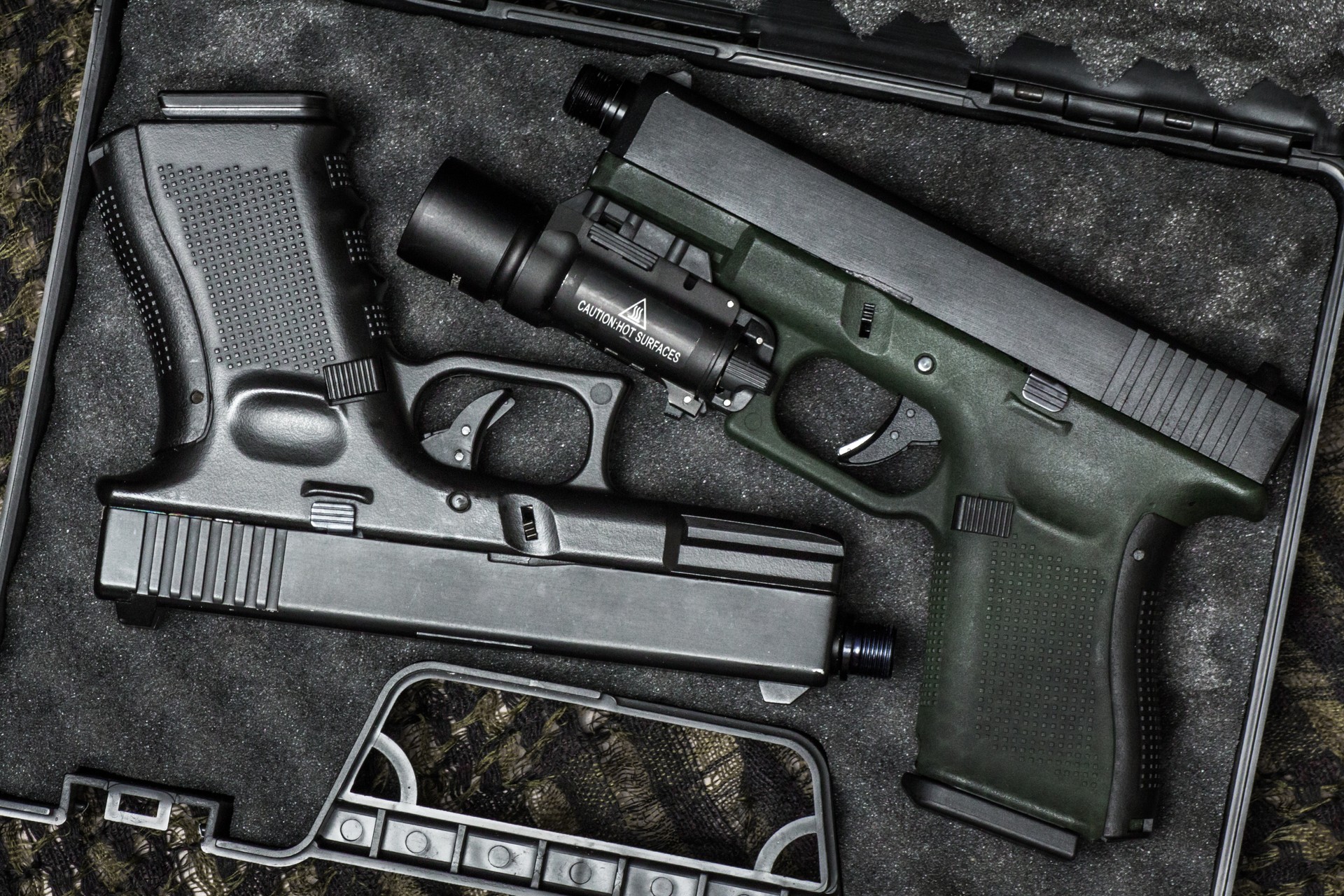 Glock 19 gen4 and gen5 model, Glock polymer pistol and popular handgun weapon with flashlight attachment olive green color and black.